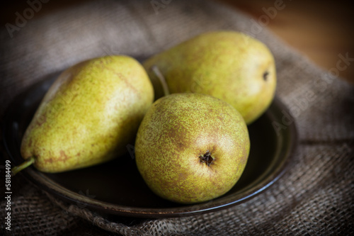 Photo: Fresh ripe pears on natural background. Fresh ripe pears on natural background.