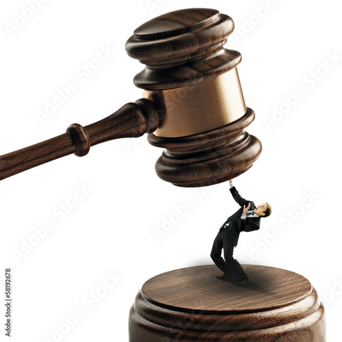 Photo: Business man scared of justice Business man scared of justice