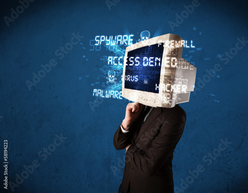 Photo: Monitor head person with hacker type of signs on the screen Monitor head person with hacker type of signs on the screen