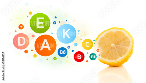 Photo: Healthy fruits with colorful vitamin symbols and icons Healthy fruits with colorful vitamin symbols and icons