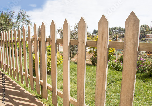 Photo: Wooden fence and grass Wooden fence and grass