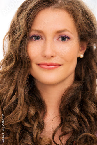 Photo: Beautiful girl with curly hair Beautiful girl with curly hair