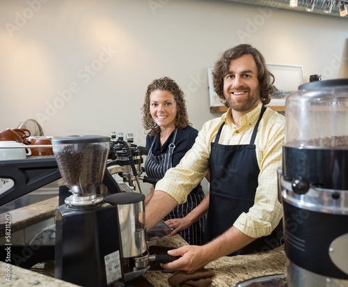 Photo: Colleagues Working In Coffeeshop Colleagues Working In Coffeeshop