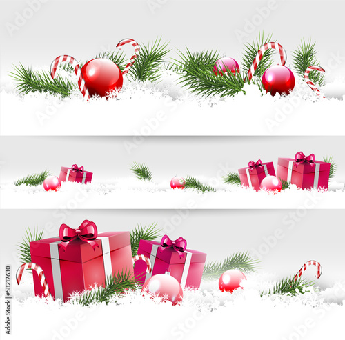 Vector: Set of three Christmas borders with gifts, balls and branches Set of three Christmas borders with gifts, balls and branches