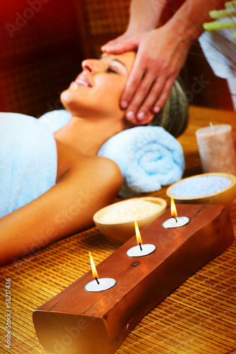Photo: Beautiful woman having massage. Beautiful woman having massage.