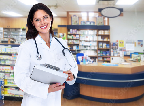 Photo: Pharmacist woman. Pharmacist woman.