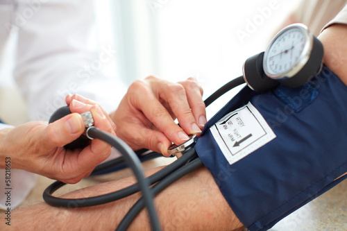 Photo: Blood pressure measuring. Blood pressure measuring.