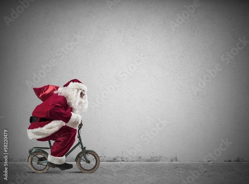 Photo: Fast Santa Claus on the bike Fast Santa Claus on the bike