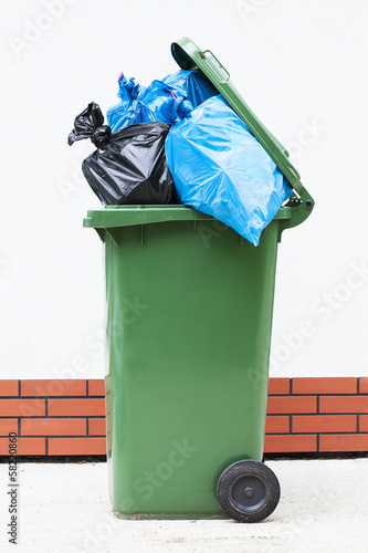 Photo: Rubbish sacks in bin Rubbish sacks in bin