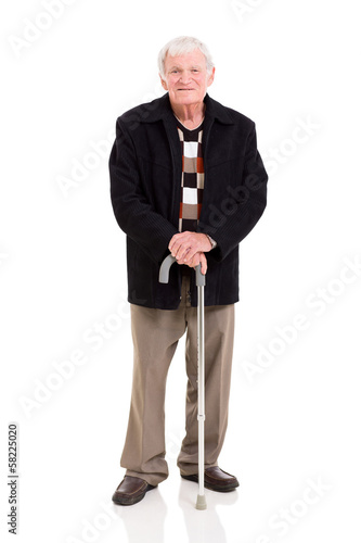 Photo: elderly man with walking stick elderly man with walking stick