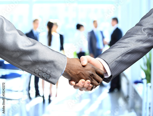 Photo: Business people shaking hands Business people shaking hands