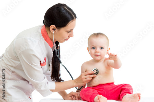 Photo: doctor examining baby girl doctor examining baby girl