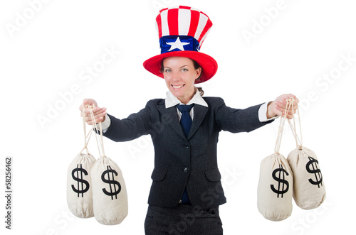 Photo: Businesswoman with sacks of money on white Businesswoman with sacks of money on white