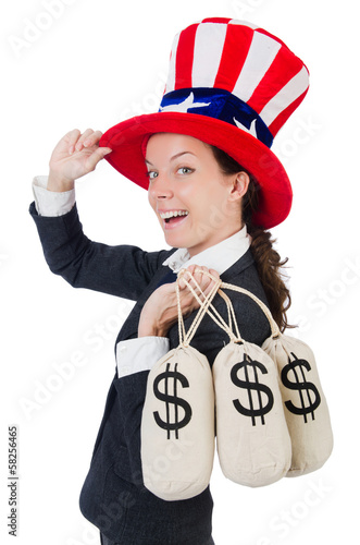 Photo: Businesswoman with sacks of money on white Businesswoman with sacks of money on white
