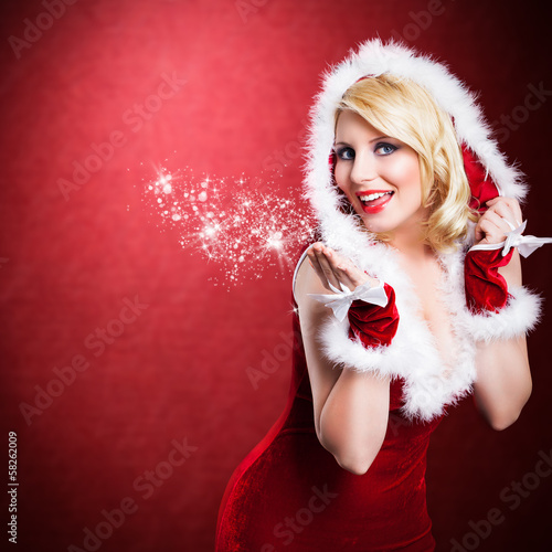 Photo: Weihnachtsfrau mit Sternchenstaub Weihnachtsfrau mit Sternchenstaub