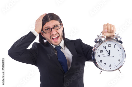 Photo: Businessman with clock isolated on white Businessman with clock isolated on white
