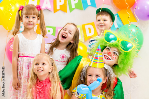 Photo: jolly kids group and clown on birthday party jolly kids group and clown on birthday party