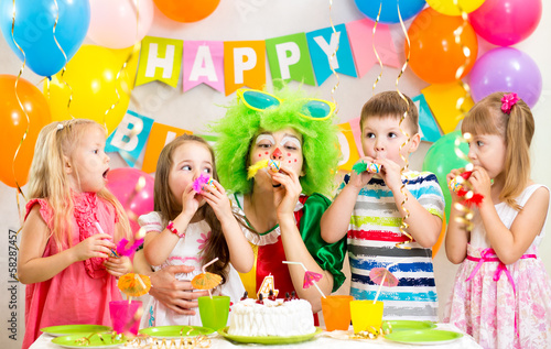 Photo: children and clown at birthday party children and clown at birthday party
