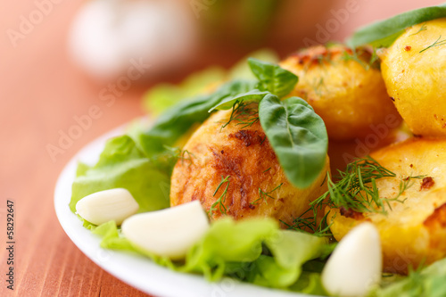 Photo: baked potatoes with garlic baked potatoes with garlic