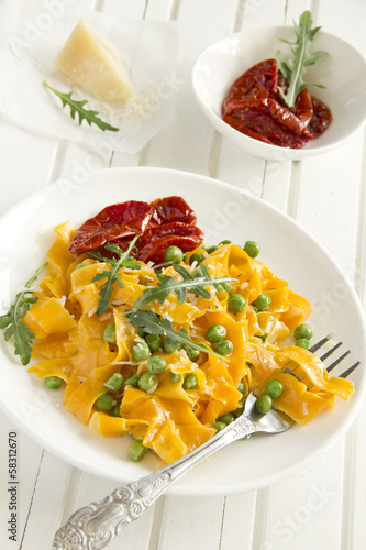Photo: Pumpkin pasta with tomato and basil. Pumpkin pasta with tomato and basil.