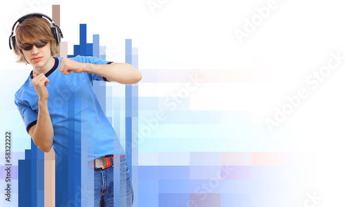 Photo: Happy smiling young man dancing Happy smiling young man dancing