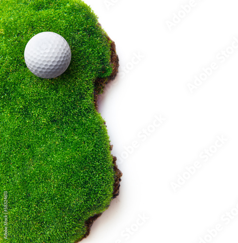 Photo: Golf ball on green grass field. Golf ball on green grass field.
