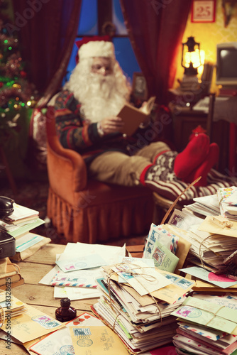 Photo: Santa Claus relaxing at home Santa Claus relaxing at home