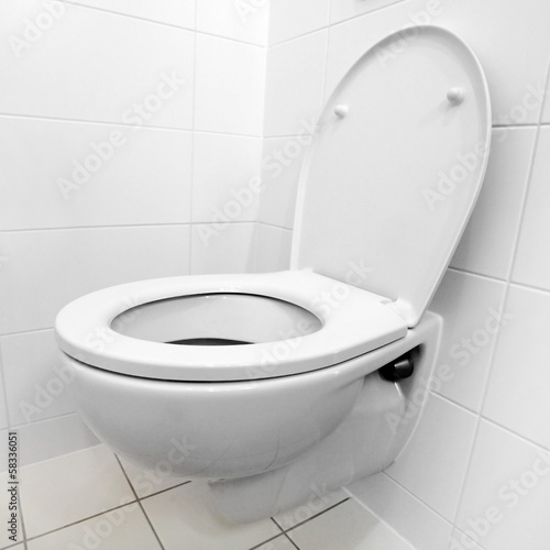 Photo: Toilet bowl in a modern bathroom. Toilet bowl in a modern bathroom.