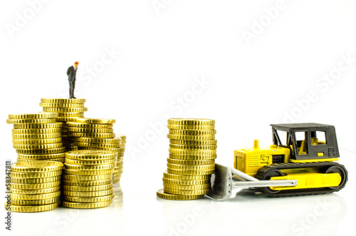 Photo: Raupe schiebt Geld zu Manager Raupe schiebt Geld zu Manager