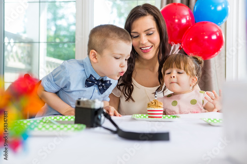 Photo: Family Celebrating Boy's Birthday Family Celebrating Boy's Birthday