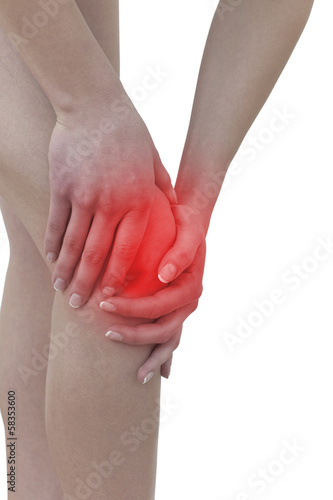 Photo: Acute pain in a woman knee Acute pain in a woman knee