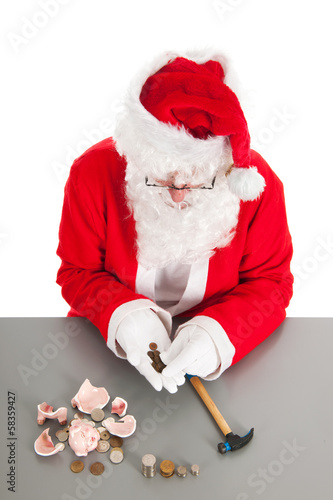 Photo: Santa counting coins Santa counting coins