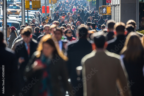 Photo: Anonymous crowd of people walking on city street Anonymous crowd of people walking on city street
