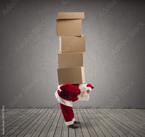 Photo: Santa Claus with many gifts Santa Claus with many gifts
