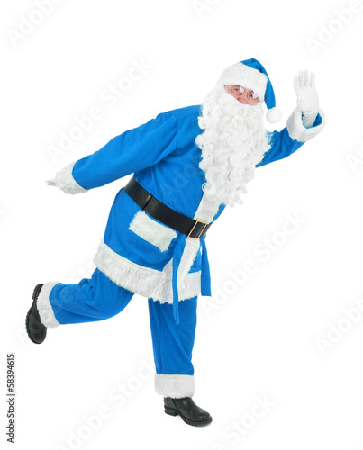 Photo: Funny blue santa waves hand Funny blue santa waves hand