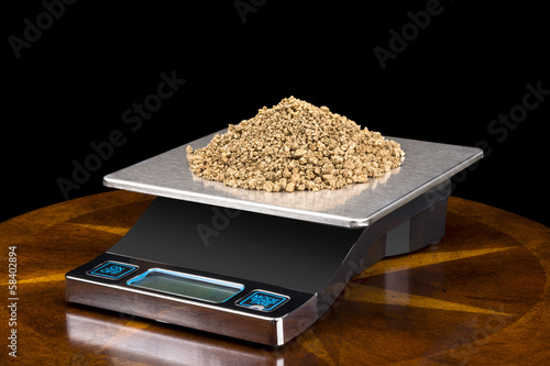 Photo: Gold Nuggets on Scale Gold Nuggets on Scale