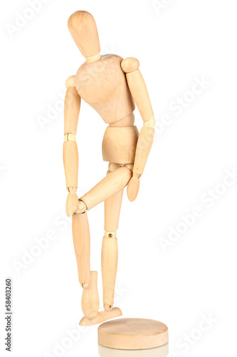 Photo: Joint pain at wooden mannequin isolated on white Joint pain at wooden mannequin isolated on white