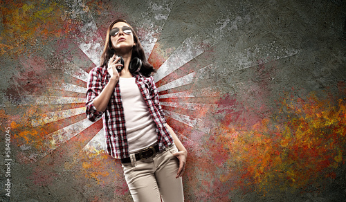 Photo: Young woman with headphones Young woman with headphones