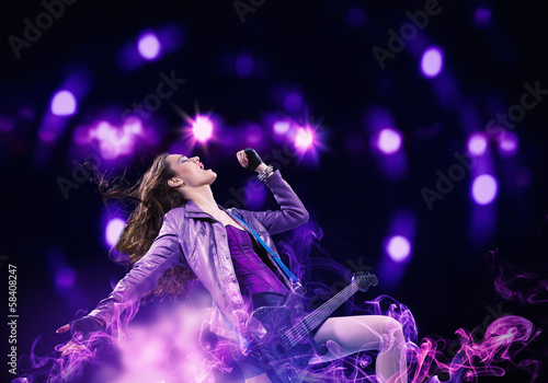 Photo: Rock passionate girl with black wings Rock passionate girl with black wings