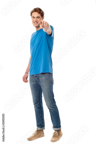 Photo: Cheerful man pointing towards camera Cheerful man pointing towards camera