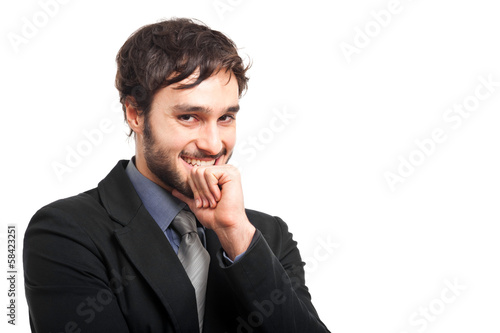 Photo: Smiling businessman isolated on white Smiling businessman isolated on white
