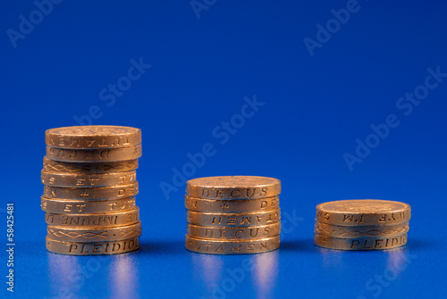 Photo: Stacks of pound coins Stacks of pound coins