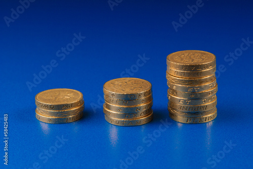 Photo: Stacks of pound coins Stacks of pound coins