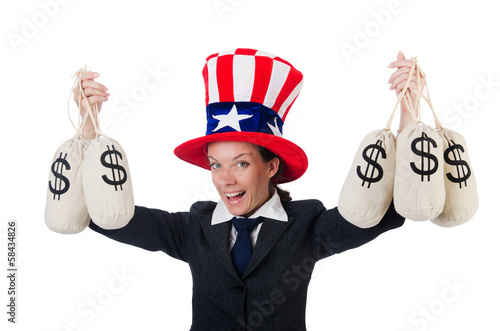 Photo: Businesswoman with sacks of money on white Businesswoman with sacks of money on white