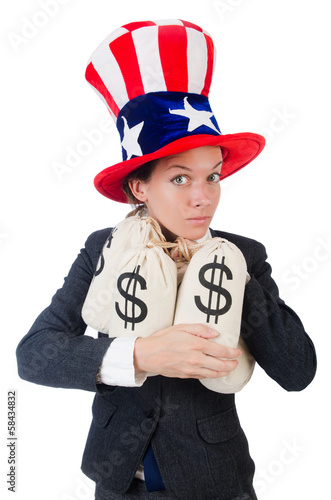 Photo: Businesswoman with sacks of money on white Businesswoman with sacks of money on white