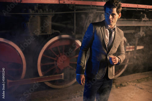 Photo: Handsome fit man with classic haircut Handsome fit man with classic haircut