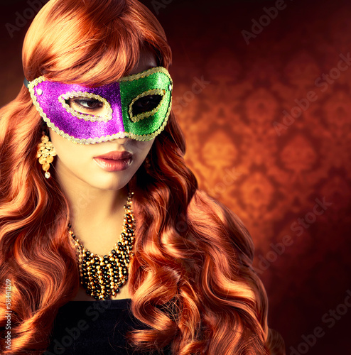 Photo: Beautiful Girl in a Carnival mask Beautiful Girl in a Carnival mask