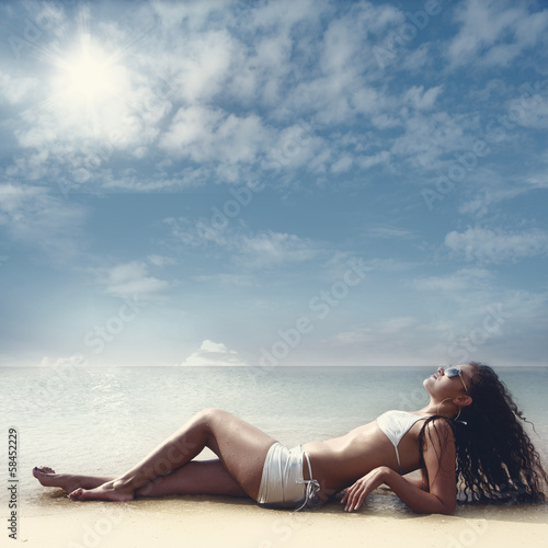 Photo: Beautiful brunette on vacation Beautiful brunette on vacation