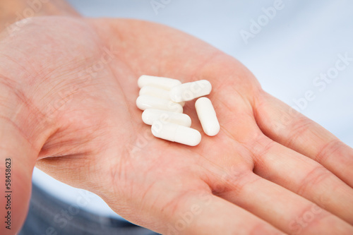 Photo: Hand Holding Medicines Hand Holding Medicines