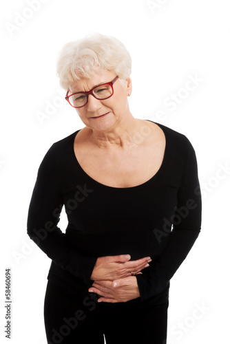 Photo: An old lady is having a stomachache. An old lady is having a stomachache.